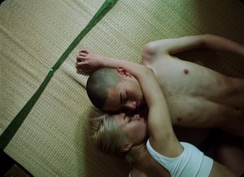 Movie still from “ZNTNDR - Untitled Us” (2022), directed by Jovan Todorović – Medium shot, Overhead angle