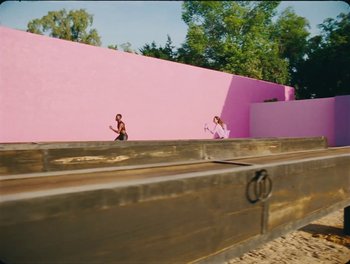 Movie still from “Elton John, Britney Spears - Hold Me Closer” (2022), directed by Tanu Muiño – Extreme Wide shot, Low angle