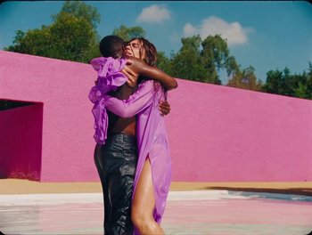 Movie still from “Elton John, Britney Spears - Hold Me Closer” (2022), directed by Tanu Muiño – Medium shot, Low angle