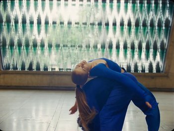 Movie still from “Elton John, Britney Spears - Hold Me Closer” (2022), directed by Tanu Muiño – Wide shot, Low angle