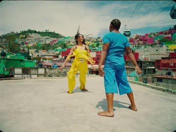 Movie still from “Elton John, Britney Spears - Hold Me Closer” (2022), directed by Tanu Muiño – Wide shot, Low angle