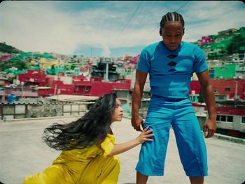 Movie still from “Elton John, Britney Spears - Hold Me Closer” (2022), directed by Tanu Muiño – Medium shot, Low angle