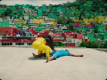 Movie still from “Elton John, Britney Spears - Hold Me Closer” (2022), directed by Tanu Muiño – Wide shot, Overhead angle