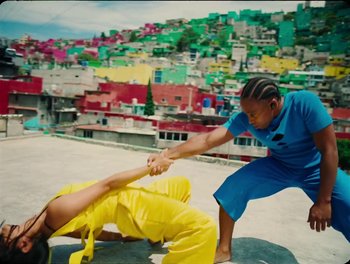 Movie still from “Elton John, Britney Spears - Hold Me Closer” (2022), directed by Tanu Muiño – Wide shot, Overhead angle