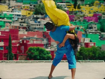 Movie still from “Elton John, Britney Spears - Hold Me Closer” (2022), directed by Tanu Muiño – Wide shot, Low angle