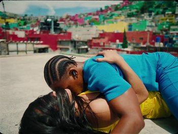 Movie still from “Elton John, Britney Spears - Hold Me Closer” (2022), directed by Tanu Muiño – Medium shot, Overhead angle