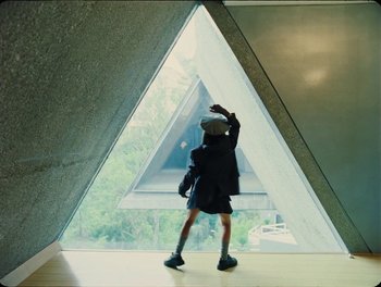 Movie still from “Elton John, Britney Spears - Hold Me Closer” (2022), directed by Tanu Muiño – Wide shot, Low angle