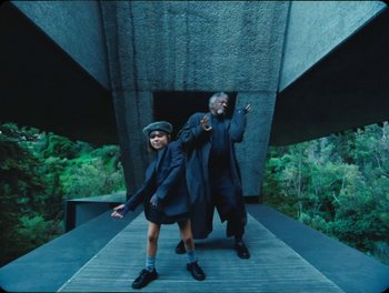 Movie still from “Elton John, Britney Spears - Hold Me Closer” (2022), directed by Tanu Muiño – Wide shot, Low angle