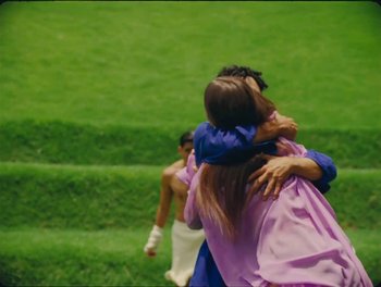 Movie still from “Elton John, Britney Spears - Hold Me Closer” (2022), directed by Tanu Muiño – Medium shot, High angle