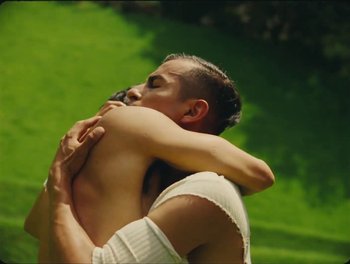 Movie still from “Elton John, Britney Spears - Hold Me Closer” (2022), directed by Tanu Muiño – Medium shot, High angle