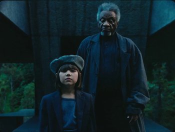 Movie still from “Elton John, Britney Spears - Hold Me Closer” (2022), directed by Tanu Muiño – Medium shot, High angle