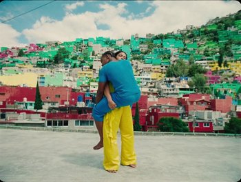 Movie still from “Elton John, Britney Spears - Hold Me Closer” (2022), directed by Tanu Muiño – Wide shot, Low angle