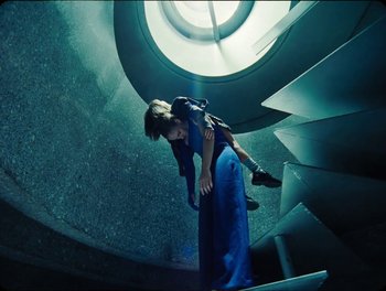 Movie still from “Elton John, Britney Spears - Hold Me Closer” (2022), directed by Tanu Muiño – Wide shot, Overhead angle