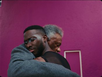 Movie still from “Elton John, Britney Spears - Hold Me Closer” (2022), directed by Tanu Muiño – Close Up shot, Low angle