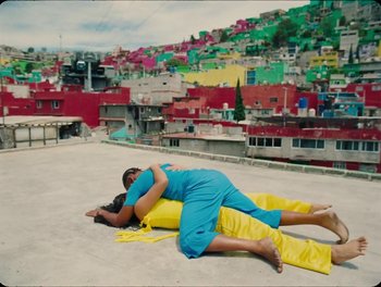 Movie still from “Elton John, Britney Spears - Hold Me Closer” (2022), directed by Tanu Muiño – Wide shot, Overhead angle