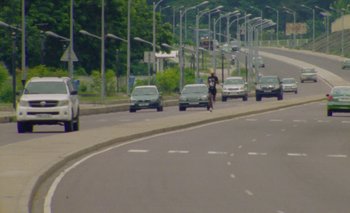 Movie still from “Oko Ebombo - Nalingi Yo” (2022), directed by Frank Lebon – Extreme Wide shot, High angle