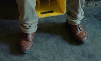 Movie still from “Oko Ebombo - Nalingi Yo” (2022), directed by Frank Lebon – Extreme Close Up shot, Overhead angle