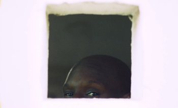 Movie still from “Oko Ebombo - Nalingi Yo” (2022), directed by Frank Lebon – Extreme Close Up shot, Low angle