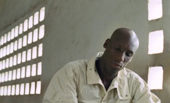 Movie still from “Oko Ebombo - Nalingi Yo” (2022), directed by Frank Lebon – Close Up shot, High angle