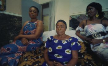 Movie still from “Oko Ebombo - Nalingi Yo” (2022), directed by Frank Lebon – Medium shot, High angle