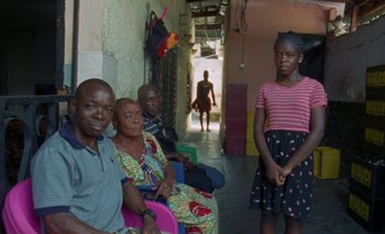 Movie still from “Oko Ebombo - Nalingi Yo” (2022), directed by Frank Lebon – Wide shot, High angle