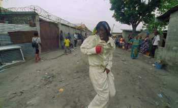 Movie still from “Oko Ebombo - Nalingi Yo” (2022), directed by Frank Lebon – Medium shot, Low angle