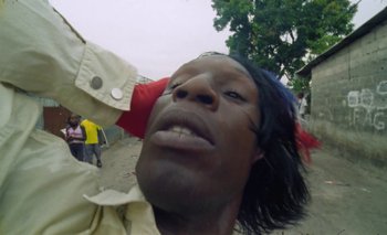 Movie still from “Oko Ebombo - Nalingi Yo” (2022), directed by Frank Lebon – Extreme Close Up shot, Low angle