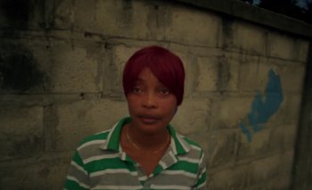 Movie still from “Oko Ebombo - Nalingi Yo” (2022), directed by Frank Lebon – Close Up shot, High angle