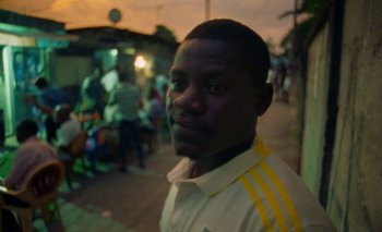 Movie still from “Oko Ebombo - Nalingi Yo” (2022), directed by Frank Lebon – Close Up shot, Low angle