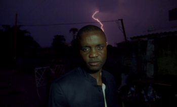 Movie still from “Oko Ebombo - Nalingi Yo” (2022), directed by Frank Lebon – Close Up shot, Low angle