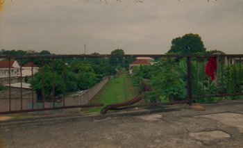 Movie still from “Oko Ebombo - Nalingi Yo” (2022), directed by Frank Lebon – Extreme Wide shot, High angle