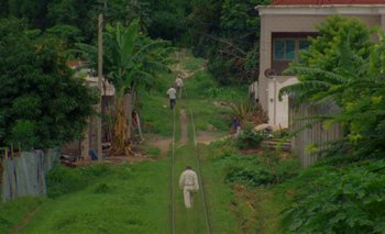Movie still from “Oko Ebombo - Nalingi Yo” (2022), directed by Frank Lebon – Extreme Wide shot, High angle