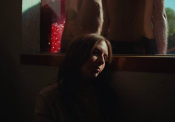 Movie still from “Lila Drew - Bad Juice” (2022), directed by Vincent Haycock – Medium shot, Low angle