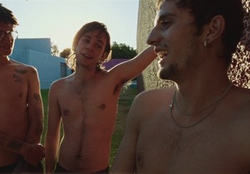 Movie still from “Lila Drew - Bad Juice” (2022), directed by Vincent Haycock – Medium shot, Low angle