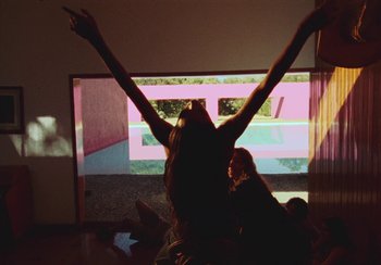 Movie still from “Lila Drew - Bad Juice” (2022), directed by Vincent Haycock – Medium shot, Low angle