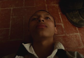 Movie still from “Lila Drew - Bad Juice” (2022), directed by Vincent Haycock – Close Up shot, Overhead angle