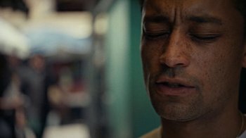 Movie still from “Loyle Carner - Georgetown” (2022), directed by Machine Operated – Extreme Close Up shot, Low angle