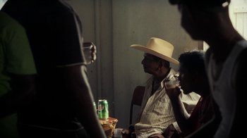 Movie still from “Loyle Carner - Georgetown” (2022), directed by Machine Operated – Medium shot, Over the shoulder angle