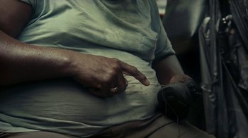 Movie still from “Loyle Carner - Georgetown” (2022), directed by Machine Operated – Extreme Close Up shot, Overhead angle