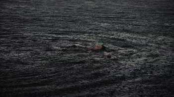 Movie still from “Loyle Carner - Georgetown” (2022), directed by Machine Operated – Extreme Wide shot, High angle