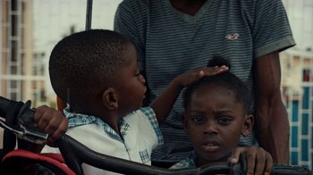 Movie still from “Loyle Carner - Georgetown” (2022), directed by Machine Operated – Close Up shot, High angle