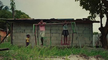 Movie still from “Loyle Carner - Georgetown” (2022), directed by Machine Operated – Wide shot, High angle