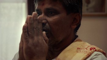 Movie still from “Loyle Carner - Georgetown” (2022), directed by Machine Operated – Extreme Close Up shot, Low angle