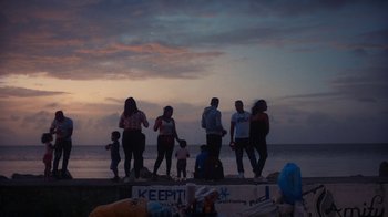 Movie still from “Loyle Carner - Georgetown” (2022), directed by Machine Operated – Extreme Wide shot, Low angle