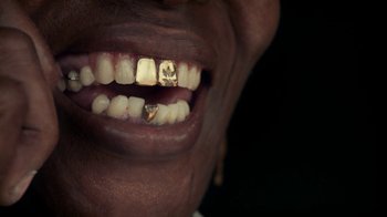 Movie still from “Loyle Carner - Georgetown” (2022), directed by Machine Operated – Extreme Close Up shot, Overhead angle