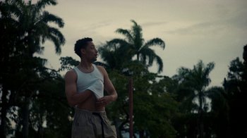 Movie still from “Loyle Carner - Georgetown” (2022), directed by Machine Operated – Medium shot, Low angle