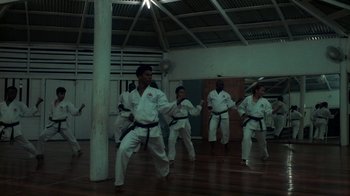 Movie still from “Loyle Carner - Georgetown” (2022), directed by Machine Operated – Extreme Wide shot, High angle