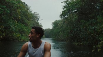 Movie still from “Loyle Carner - Georgetown” (2022), directed by Machine Operated – Medium shot, High angle
