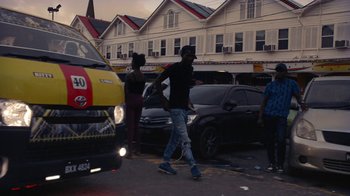 Movie still from “Loyle Carner - Georgetown” (2022), directed by Machine Operated – Extreme Wide shot, Low angle