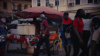 Movie still from “Loyle Carner - Georgetown” (2022), directed by Machine Operated – Medium shot, High angle